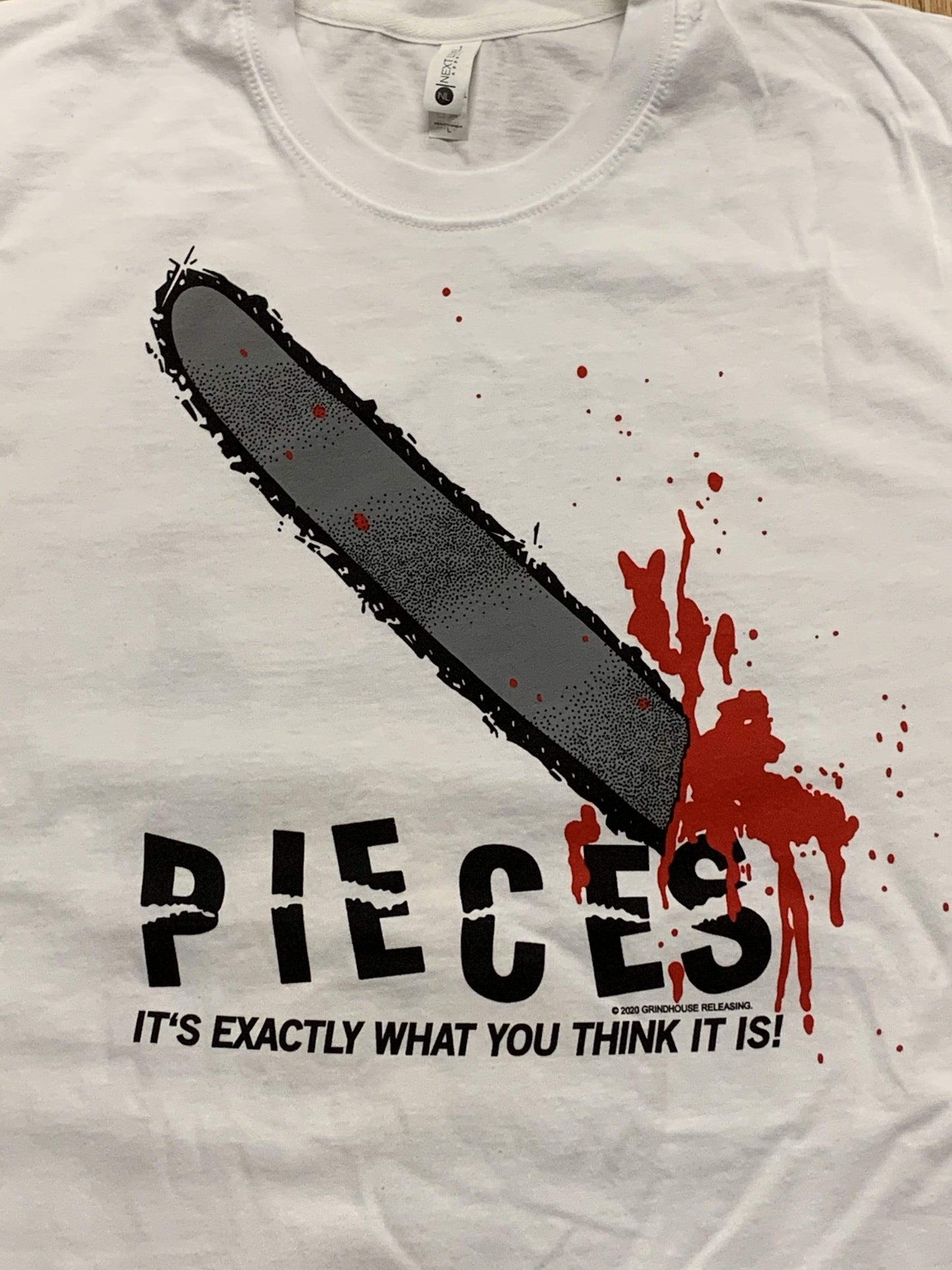 PIECES T-shirt: 1983 Chainsaw T-shirt (double-sided)